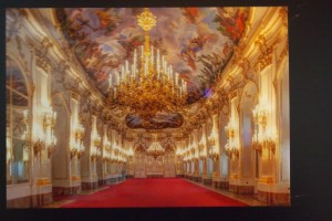 Photo of a postcard of the great hall in Schonbrunn castle