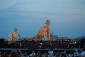 The naked men on stage.