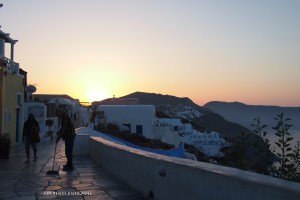 The sun peeks over the cliffs